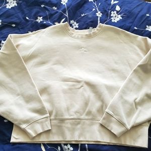 Cream color Adidas crop sweatshirt size large. Excellent condition